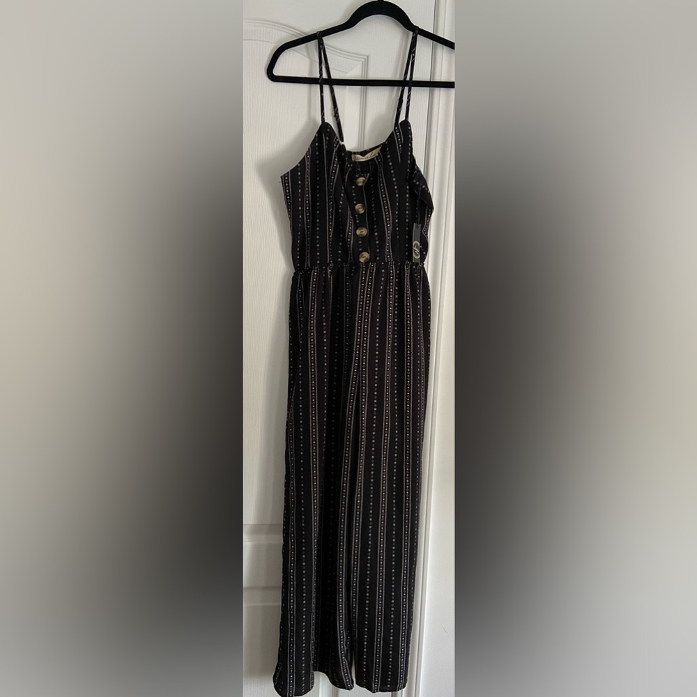 Beautiful NEW with TAGS  black jumpsuit size L